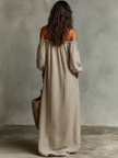 FJØRNA linen maxi dress featuring a relaxed fit, sleeveless design, and flowing fabric ideal for casual summer wear