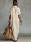Red linen embroidered maxi dress for women by FJØRNA, featuring intricate embroidery and flowing fabric, perfect for warm weather.