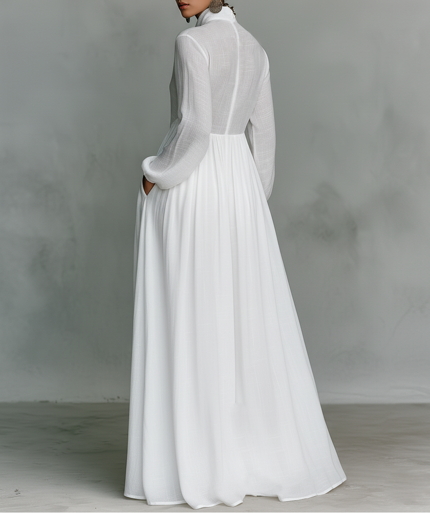 FJØRNA women's summer maxi dress with twist front design, made of lightweight linen fabric, flowing and stylish for warm weather.