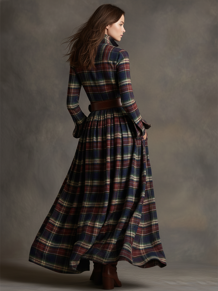 Brown FJØRNA maxi dress with a flowing silhouette, casual style, and sleeveless design, perfect for warm weather.