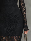 Black lace fishtail maxi dress from FJØRNA featuring intricate lace details and a fitted evening dress silhouette.