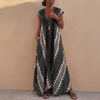 Gray FJØRNA elegant maxi dress for women with a geometric V-neck, flowing fabric, and stylish design.