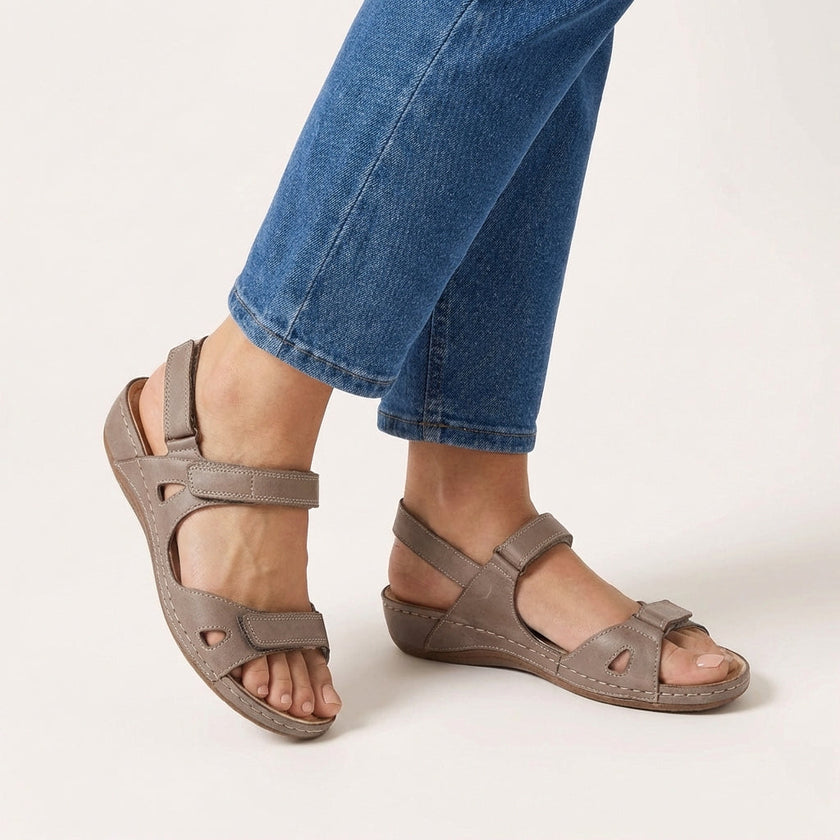 Gray FJØRNA orthopedic flat ankle strap sandals for women with adjustable fit, featuring a comfortable design and minimalist style.
