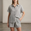 Gray FJØRNA women's two-piece striped co-ord set with button-front top and matching pants, casual and stylish.