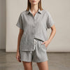 Gray FJØRNA women's two-piece striped co-ord set with button-front top and matching pants, casual and stylish.