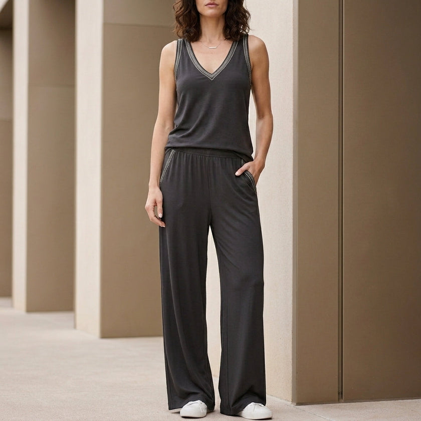 Gray summer two-piece women's co-ord set with wide-leg pants and v-neck top from FJØRNA, casual and stylish for warm weather.