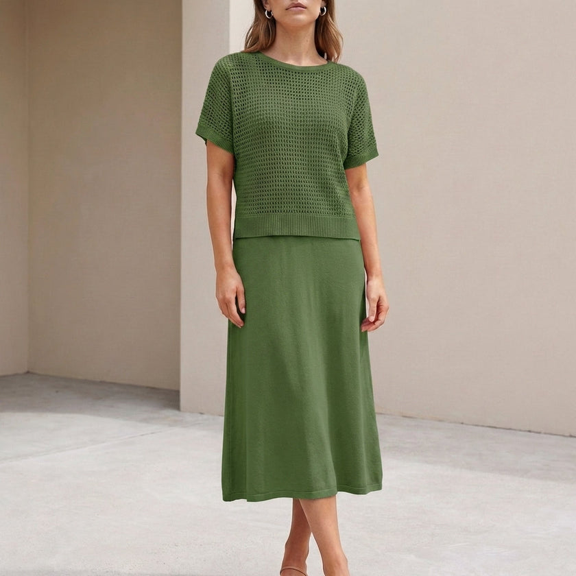 Green knit cropped two-piece set for women by FJØRNA, featuring a stylish co-ord outfit with a fitted top and matching bottoms.