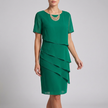 Green elegant women's ruffle chiffon dress by FJØRNA, flowing design with delicate ruffle details for stylish occasions.