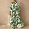 Green FJØRNA women's elegant maxi dress with V-neck and long sleeves, flowing and stylish for formal or casual occasions.