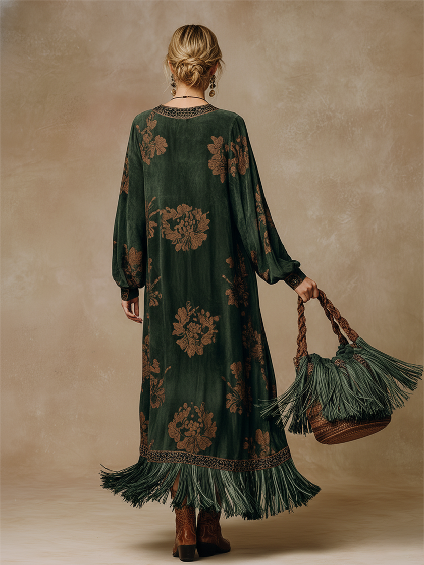 Green faux suede tassel maxi dress for women by FJØRNA, featuring a flowing silhouette and tassel details.