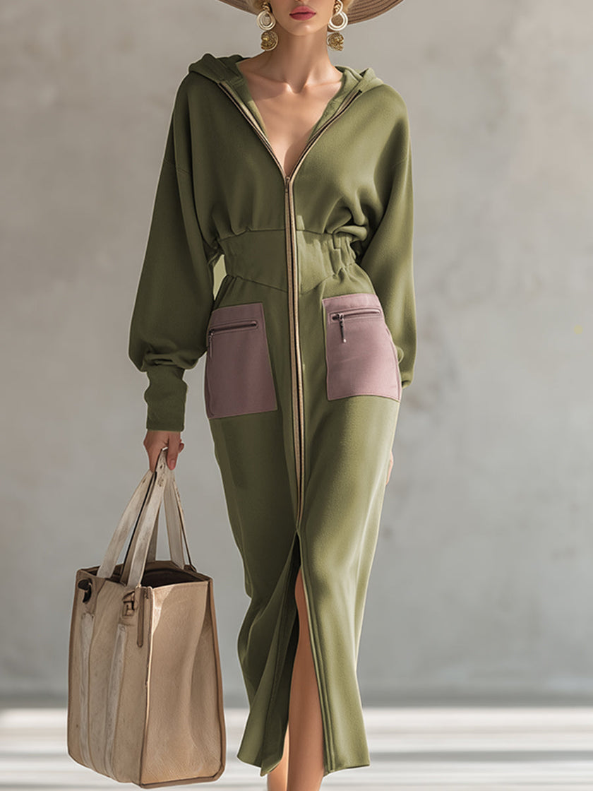 Green long sleeve maxi dress by FJØRNA, elegant evening dress with flowing fabric and fitted waist, displayed on a model.