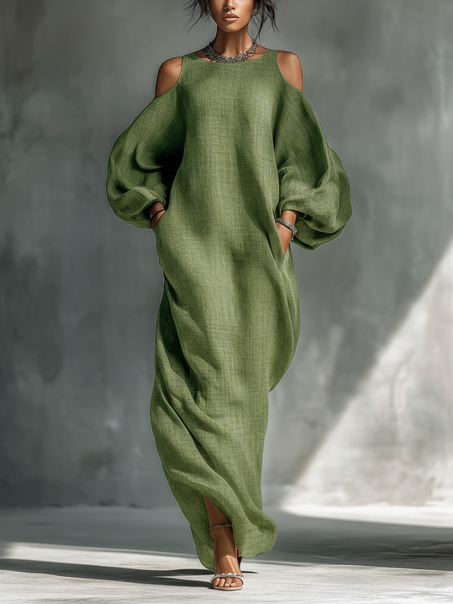 Green FJØRNA maxi dress for women with flowing fabric and sleeveless design, perfect for casual or summer wear.