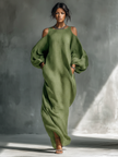 Green FJØRNA maxi dress for women, flowing and elegant, with a relaxed fit and sleeveless design, suitable for warm weather.