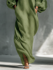 Green FJØRNA maxi dress for women, flowing fabric, sleeveless design, and ankle-length silhouette displayed in the image.