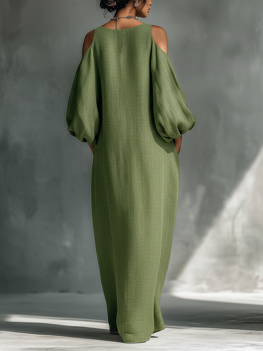 Green maxi dress for women by FJØRNA, flowing long dress with a fitted waist and elegant neckline, suitable for summer or special occasions.