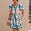 Green linen floral two-piece set for women by FJØRNA, featuring a stylish coordinated outfit with a floral pattern.