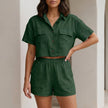 Green women's summer two-piece co-ord set by FJØRNA featuring a button front top and matching shorts.
