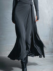 FJØRNA grey knit wrap maxi dress for women, featuring a flowing silhouette and long sleeves, displayed on a mannequin.