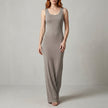 Grey FJØRNA women's sleeveless maxi dress with a scoop neck, elegant and flowy for stylish summer or evening wear.