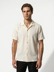 FJØRNA men's short-sleeve button-up casual summer shirt, showcasing lightweight fabric and classic collar design.