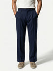 FJØRNA men's straight fit tailored trousers, classic style, in a neutral color, focused on the waist and leg fit.