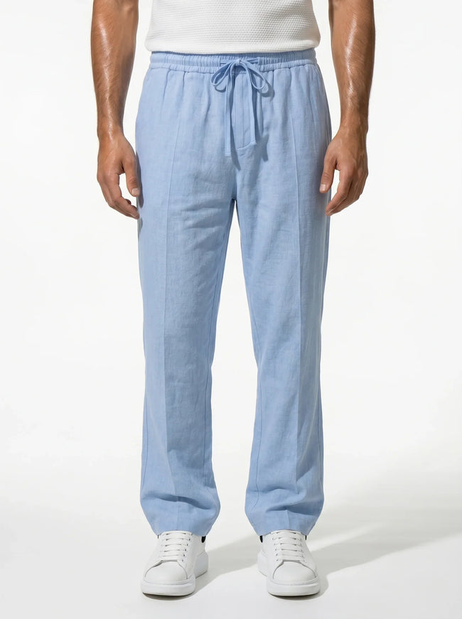 Men's linen trousers by FJØRNA with a relaxed fit, breathable fabric, ideal for summer wear.