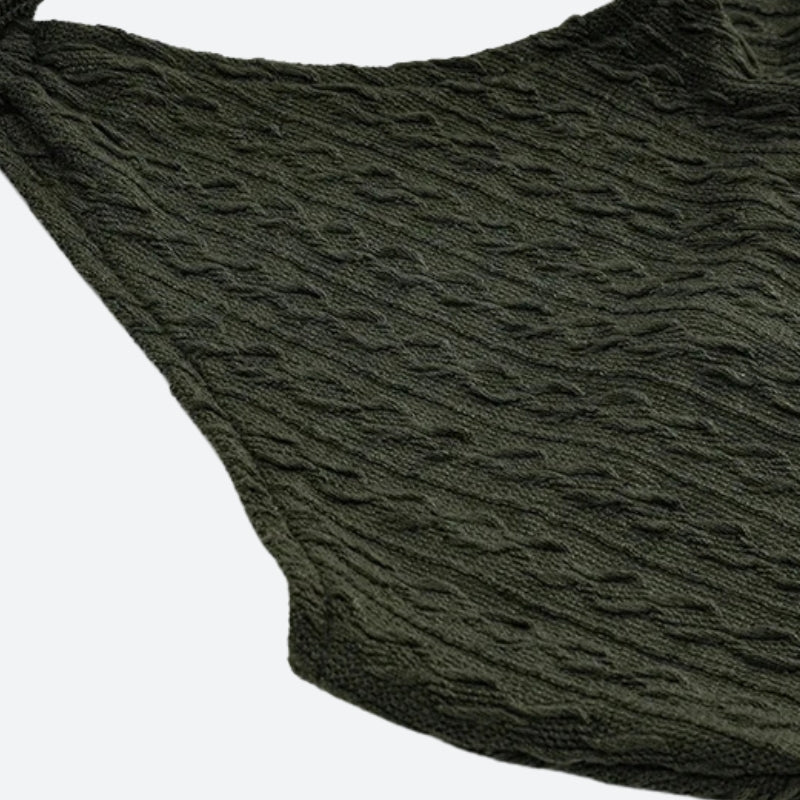 FJØRNA women's halter neck knitted mini dress, stylish party and day wear, featuring a fitted silhouette and sleeveless design.