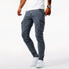 Men's FJØRNA stretch denim cargo pants with functional pockets, suited for everyday wear and leisure.