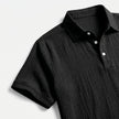 Men's linen short sleeve polo shirt and matching shorts set by FJØRNA, lightweight and casual for warm weather.