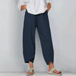 FJØRNA women's lightweight summer trousers, tapered and breathable, shown in a casual fit on a model.