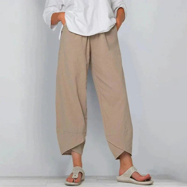 FJØRNA lightweight summer tapered breathable women's trousers, shown in a relaxed fit style perfect for warm weather wear.