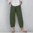 FJØRNA women's lightweight summer trousers, tapered and breathable, shown in a relaxed fit on a model.