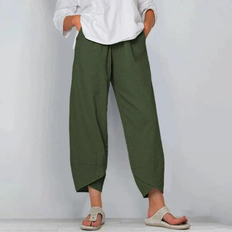 FJØRNA women's lightweight summer trousers, tapered and breathable, shown in a relaxed fit on a model.