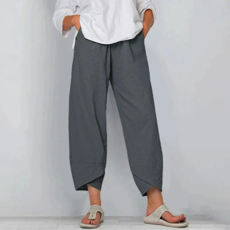 FJØRNA lightweight summer tapered breathable women's trousers, shown in a relaxed fit with a smooth fabric finish.