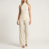 Khaki FJØRNA women's two-piece co-ord set with pleated halter neck top and matching high-waisted pants.