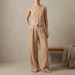 Khaki linen two-piece women's co-ord set with pleated design, stylish and elegant FJØRNA clothing for casual or dressy occasions.