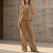 Khaki women's summer two-piece co-ord set by FJØRNA with pockets, casual style, featuring a matching top and pants.