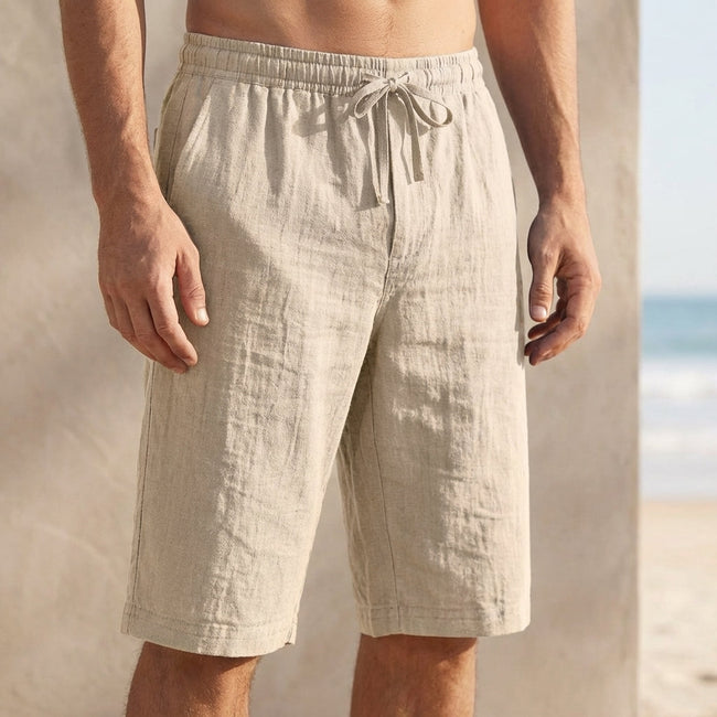 Beige linen drawstring chino shorts for men by FJØRNA, tailored fit with front pockets and relaxed casual style.