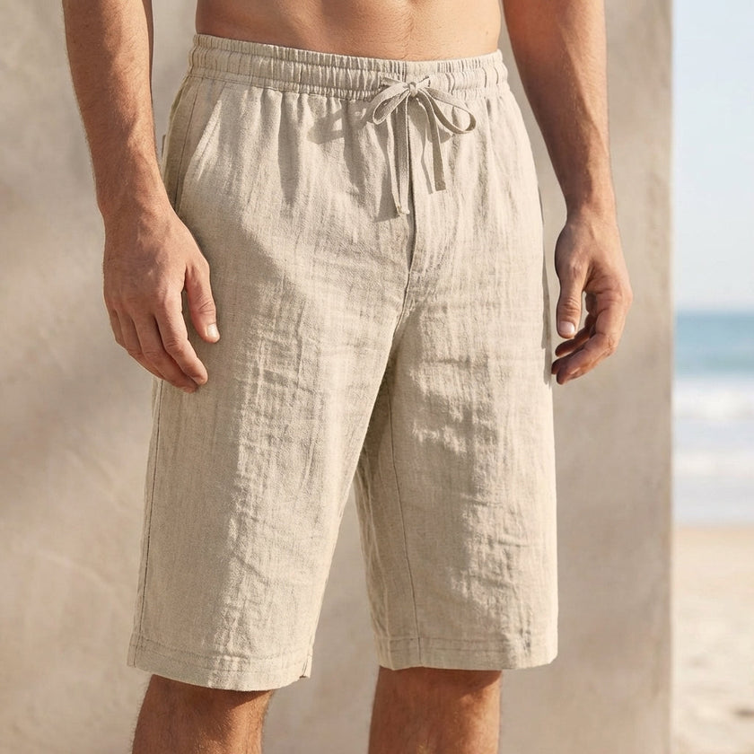 Beige linen drawstring chino shorts for men by FJØRNA, tailored fit with front pockets and relaxed casual style.