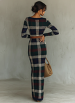 FJØRNA women's knit maxi dress featuring a flowing silhouette and long sleeves, perfect for casual or chic occasions.