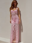FJØRNA lace women's maxi dress for evening and formal wear, featuring intricate lace fabric and elegant flowing design.