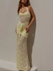 Elegant lace women's maxi dress by FJØRNA, perfect for evening and formal occasions, shown in a flowing design.