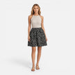 FJØRNA women's sleeveless summer dress with slim fit silhouette, lace trim, casual style, perfect for warm weather.