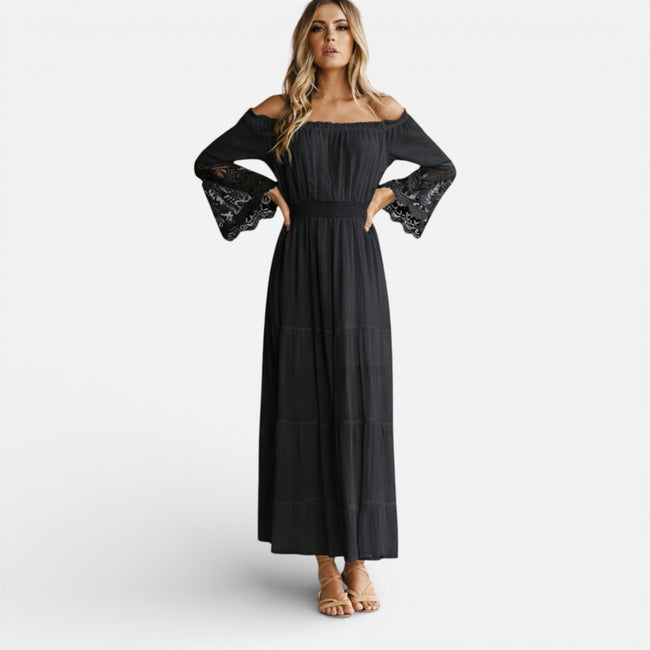 Women's off-shoulder lace maxi dress by FJØRNA, elegant summer dress with flowing silhouette and intricate lace details.