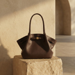 FJØRNA vegan leather medium work tote bag with waterproof design, showing sturdy handles and spacious interior for daily use.