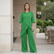 FJØRNA summer two-piece women's co-ord set featuring an asymmetric top and matching shorts in a casual lifestyle setting.