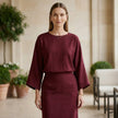 FJØRNA summer two-piece women’s wrap co-ord set worn by a woman outdoors, featuring a stylish matching top and shorts ensemble.