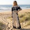 FJØRNA elegant two-piece women's co-ord set with print and drawstring, styled in a casual lifestyle setting.