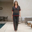 FJØRNA women's elegant two-piece chiffon leopard co-ord set styled for casual wear with flowing fabric and trendy animal print.