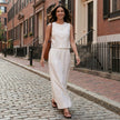 Elegant two-piece women's co-ord set by FJØRNA featuring a stylish slit design, worn in a casual lifestyle setting.
